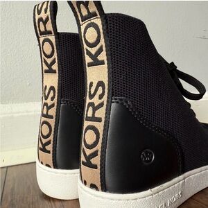 Michael Kors Black and Tan High-Top Sneakers